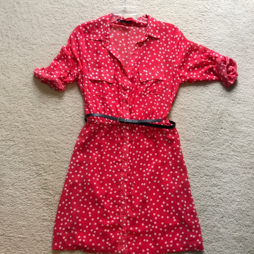 Button up shirt dress with pockets and belt.